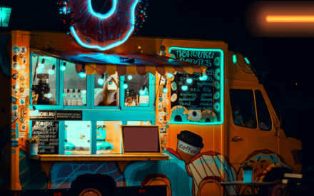 Image of a florescence yellow food truck at night with teal blue highlights around windows